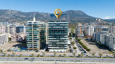 Strandnær 2+1 lejlighed til salg med fuld havudsigt i Mahmutlar, Alanya
