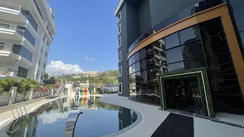Lejlighed med havudsigt og pool med sikkerhed i Alanya Kargicak, 2 og 3 soveværelser til salg